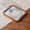 A close-up detail shot of the Clear quartz crystal bead on the Cancers Zodiac.