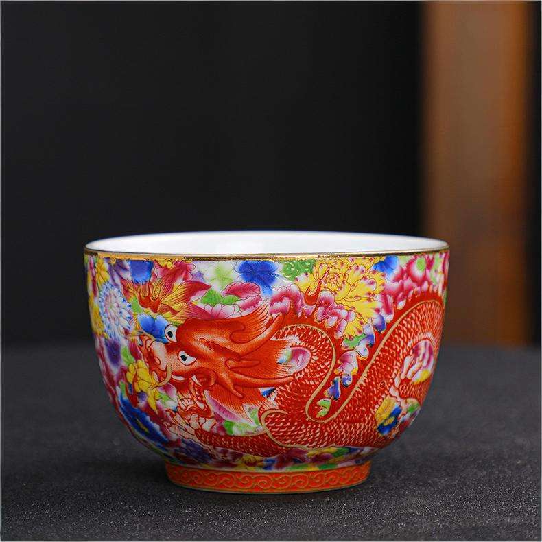 The imperial detailed Interlocking Lotus enameled handmade ceramic teacup, showcasing intricate pink and white lotus flowers.