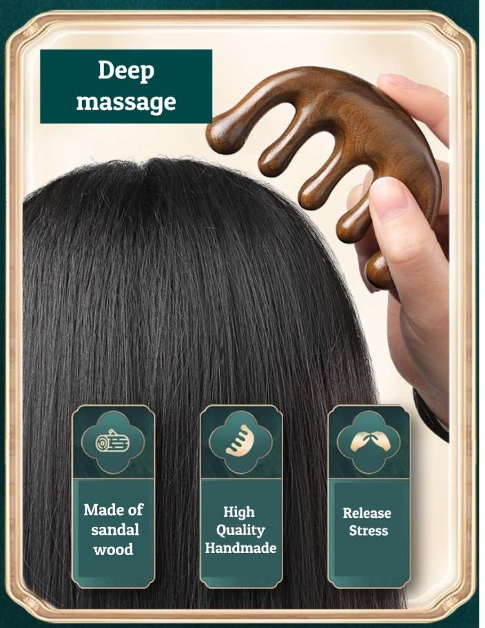 A person's hand holding the ergonomic sandalwood massage comb, showing its comfortable grip and the smooth, polished finish of the natural wood.