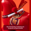Close up of a red year of the horse ceramic ornament showing the golden coin detail, greeting scroll, and glossy porcelain finish for Lunar New Year decoration.