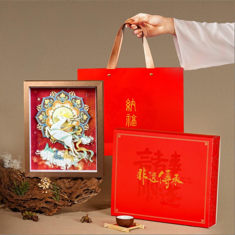 Elegant walnut framed 3D Chinese Paper Cutting artwork placed on a shelf, adding a touch of oriental Zen and Feng Shui fortune to the room.