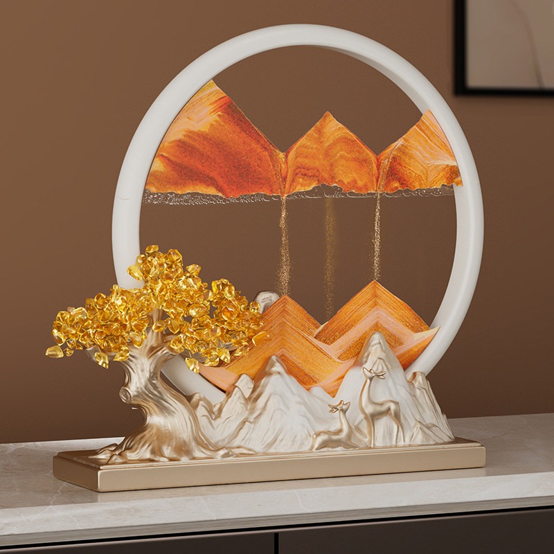 Elegant Feng Shui Moving Sand Art placed on a modern console table, showcasing the golden sand forming a mountain backing for the fortune deer statues.