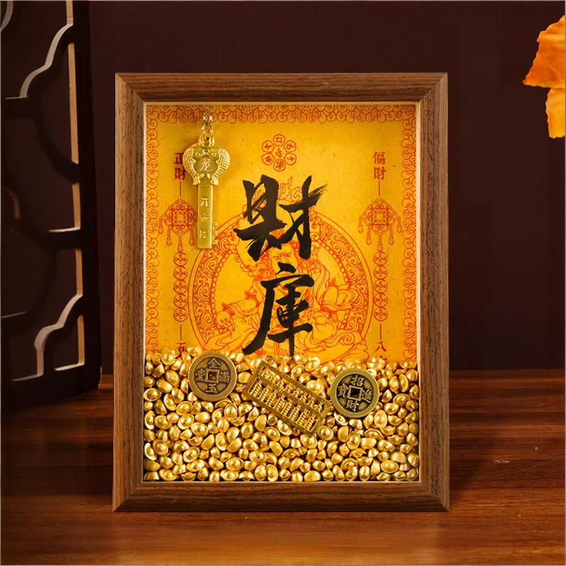Close up diagram of the Feng Shui Wealth Opening Frame highlighting the Golden Key for opening the treasury, the Brass Abacus for calculation, and the Lucky Coins.