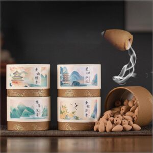 Packaging of Natural Waterfall Backflow Cones in various scents like Aged Mugwort and Sandalwood, displayed with a burning cone creating smoke.