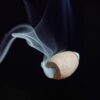 Step-by-step guide on how to light Natural Waterfall Backflow Cones and place them on the burner hole for the best smoke effect.